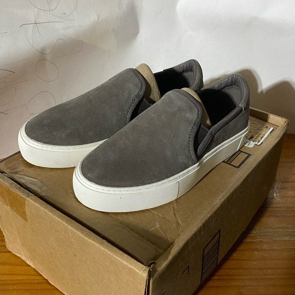 Women’s slip on Uggs. Size 6. Gray. Practically brand new. Worn once.